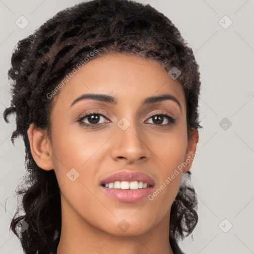 Joyful latino young-adult female with long  brown hair and brown eyes