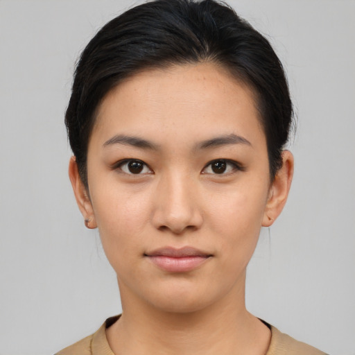 Neutral asian young-adult female with short  brown hair and brown eyes