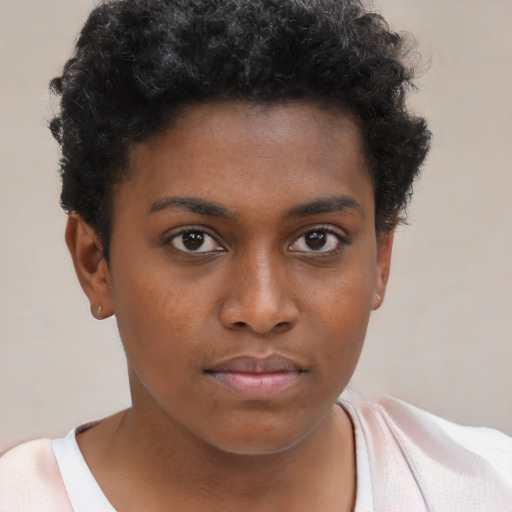 Neutral black young-adult female with short  brown hair and brown eyes