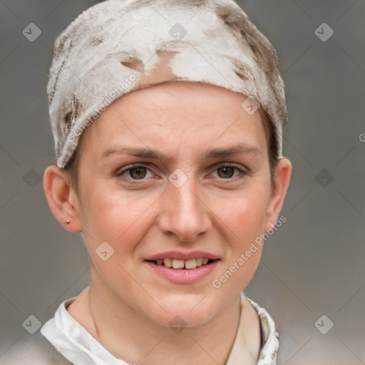 Joyful white young-adult female with short  brown hair and blue eyes