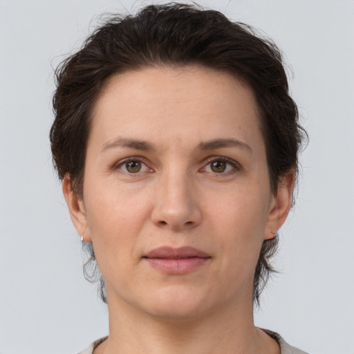 Neutral white adult female with short  brown hair and brown eyes