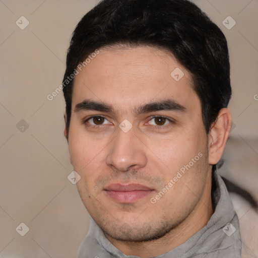 Joyful white young-adult male with short  black hair and brown eyes