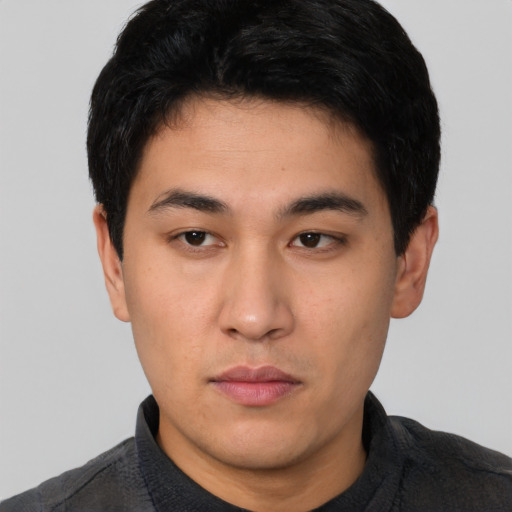 Neutral white young-adult male with short  black hair and brown eyes