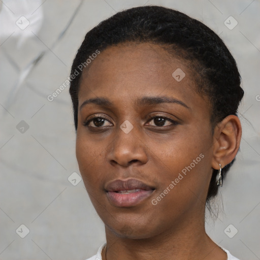 Neutral black young-adult female with short  black hair and brown eyes