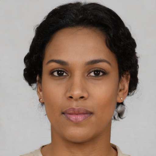 Neutral latino young-adult female with short  black hair and brown eyes