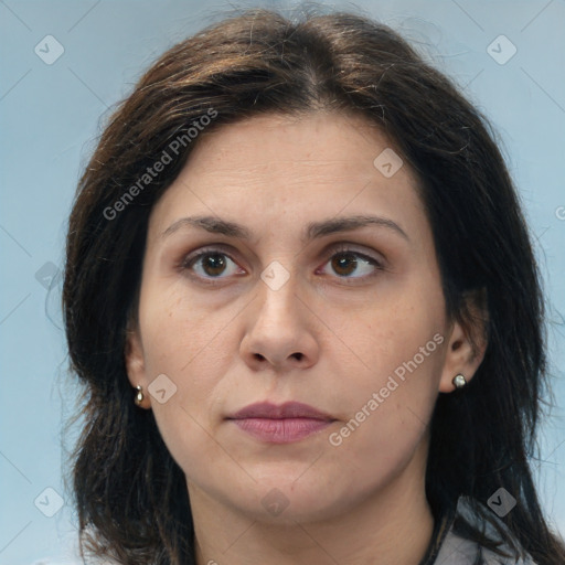 Joyful white adult female with medium  brown hair and brown eyes