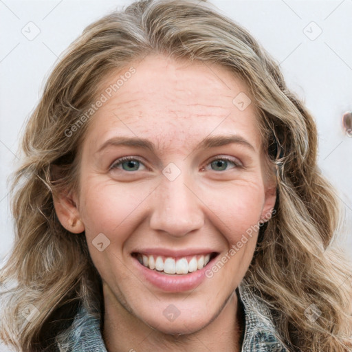 Joyful white young-adult female with long  brown hair and blue eyes