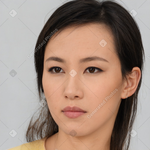 Neutral asian young-adult female with medium  brown hair and brown eyes