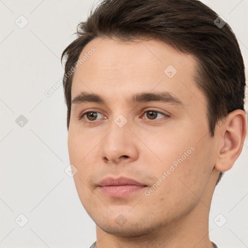 Neutral white young-adult male with short  brown hair and brown eyes