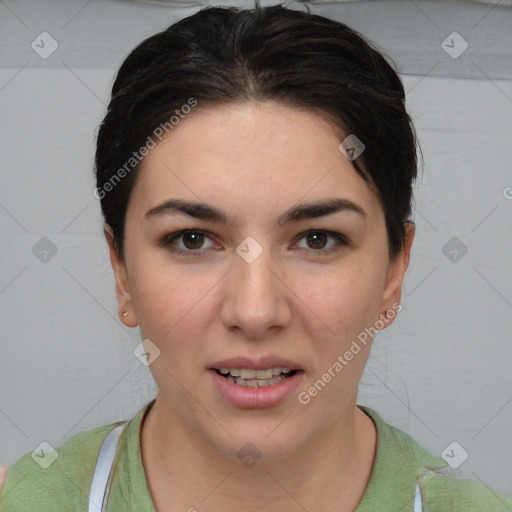 Joyful white young-adult female with short  brown hair and brown eyes