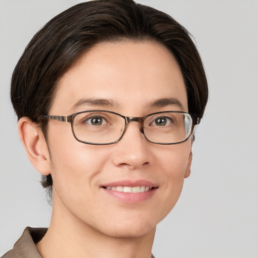 Joyful white young-adult female with short  brown hair and grey eyes