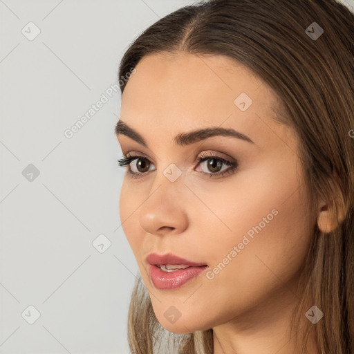 Neutral white young-adult female with long  brown hair and brown eyes