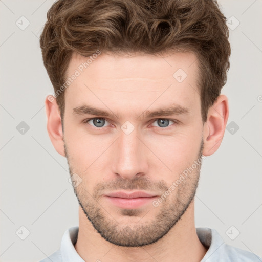 Neutral white young-adult male with short  brown hair and grey eyes