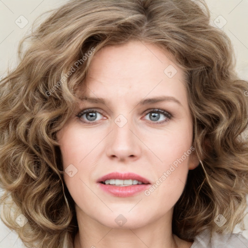 Joyful white young-adult female with medium  brown hair and green eyes