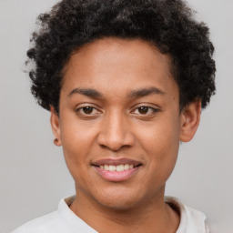 Joyful latino young-adult male with short  brown hair and brown eyes