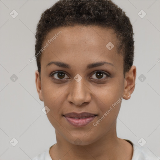 Joyful black young-adult female with short  brown hair and brown eyes