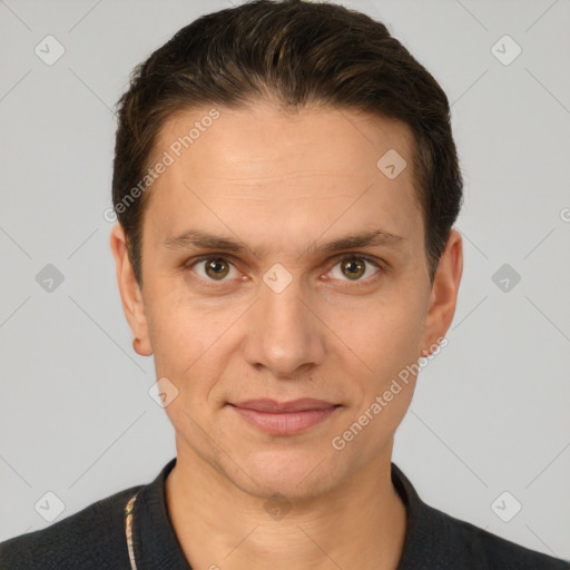 Joyful white adult male with short  brown hair and brown eyes