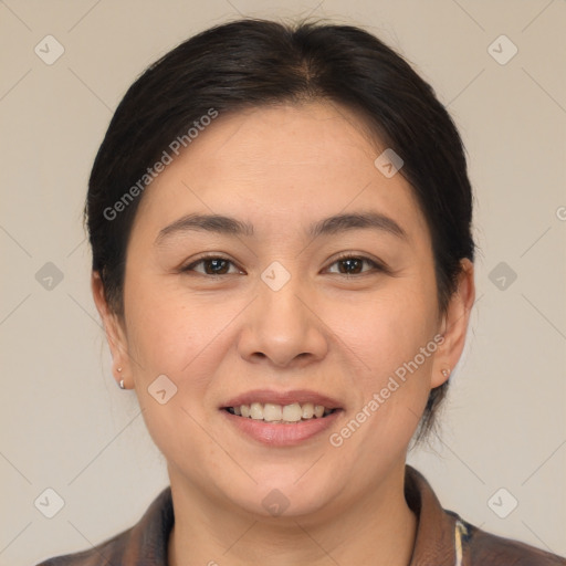 Joyful white young-adult female with medium  brown hair and brown eyes