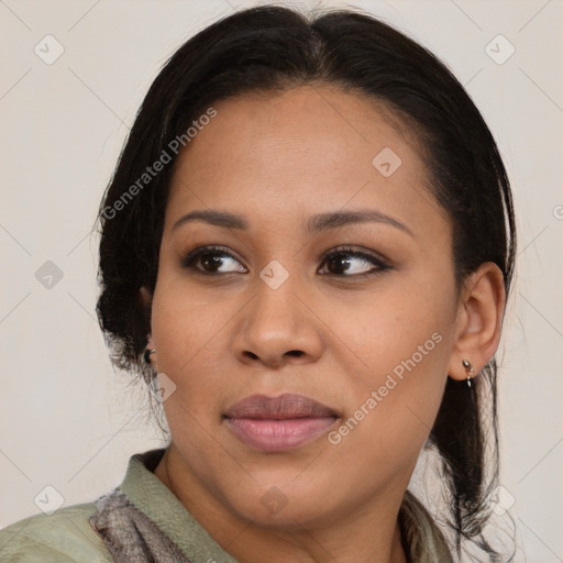 Joyful latino young-adult female with medium  brown hair and brown eyes