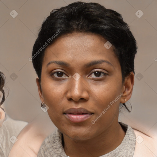 Neutral black young-adult female with short  black hair and brown eyes