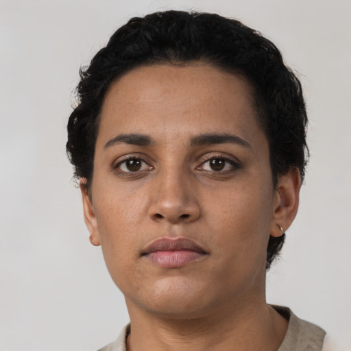 Neutral latino young-adult female with short  black hair and brown eyes