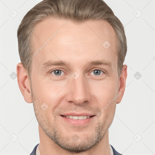 Joyful white adult male with short  brown hair and grey eyes