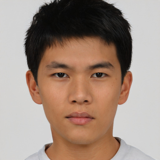 Neutral asian young-adult male with short  brown hair and brown eyes