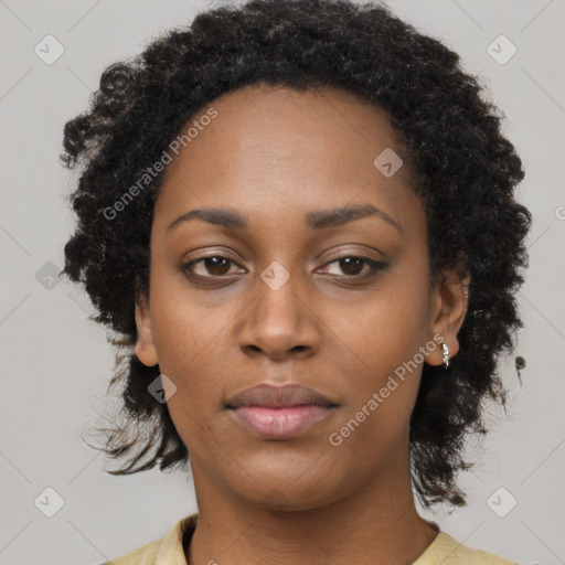 Neutral black young-adult female with medium  brown hair and brown eyes