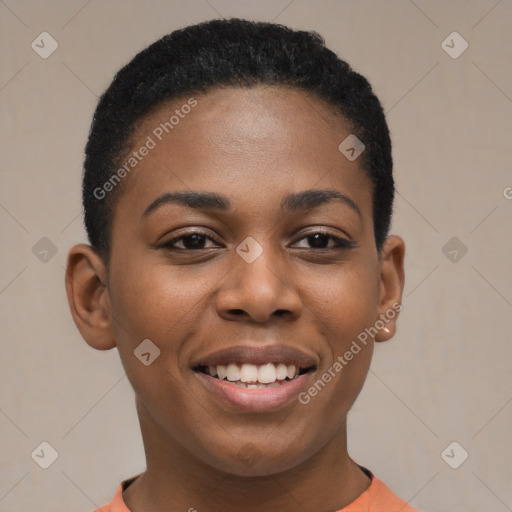 Joyful black young-adult female with short  black hair and brown eyes