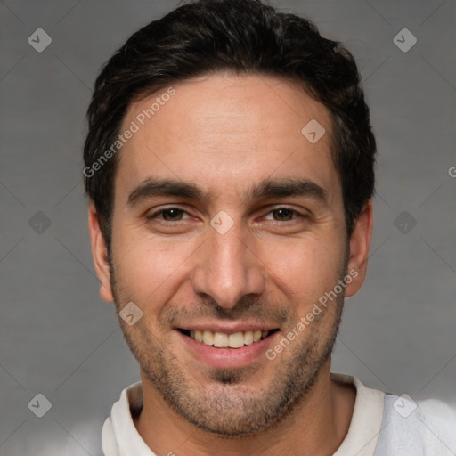 Joyful white adult male with short  brown hair and brown eyes