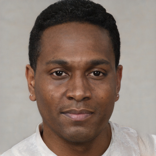 Neutral black young-adult male with short  black hair and brown eyes