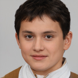 Joyful white child male with short  brown hair and brown eyes