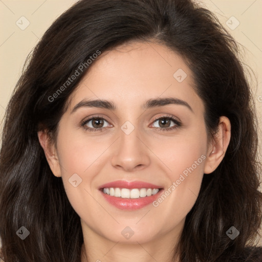 Joyful white young-adult female with long  brown hair and brown eyes