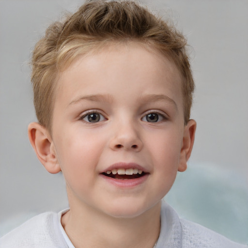 Joyful white child male with short  brown hair and brown eyes