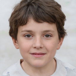 Joyful white child female with short  brown hair and brown eyes