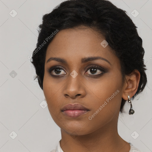 Neutral black young-adult female with short  black hair and brown eyes