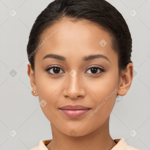 Joyful latino young-adult female with short  brown hair and brown eyes