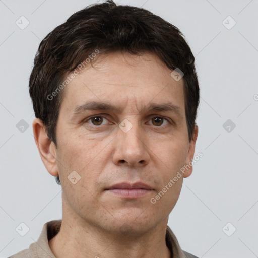 Neutral white adult male with short  brown hair and brown eyes