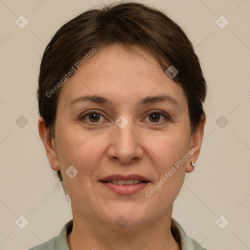 Joyful white adult female with short  brown hair and brown eyes