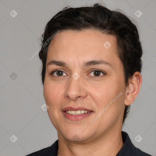 Joyful white adult female with short  brown hair and brown eyes