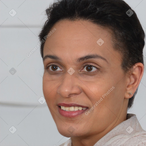 Joyful white adult female with short  brown hair and brown eyes