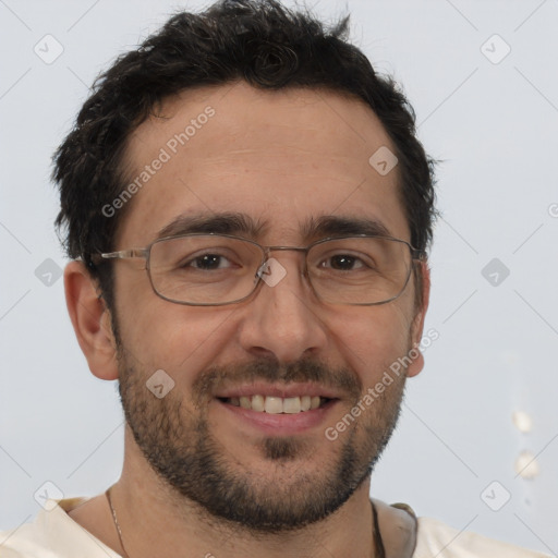 Joyful white adult male with short  brown hair and brown eyes