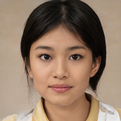 Neutral asian young-adult female with medium  black hair and brown eyes
