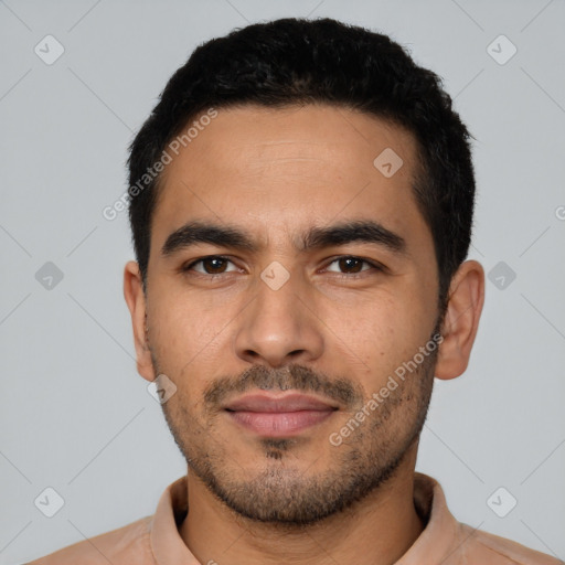 Neutral latino young-adult male with short  black hair and brown eyes