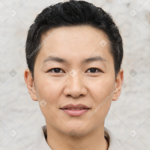 Joyful asian young-adult male with short  black hair and brown eyes