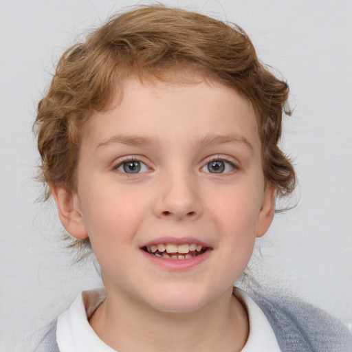 Joyful white child female with short  brown hair and blue eyes