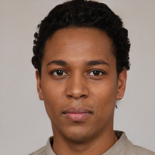 Neutral black young-adult male with short  black hair and brown eyes