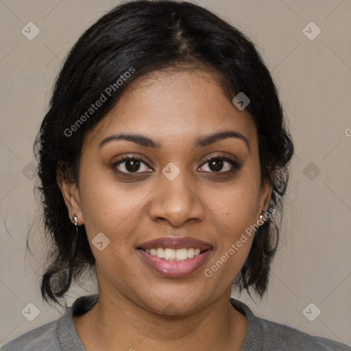 Joyful black young-adult female with medium  brown hair and brown eyes