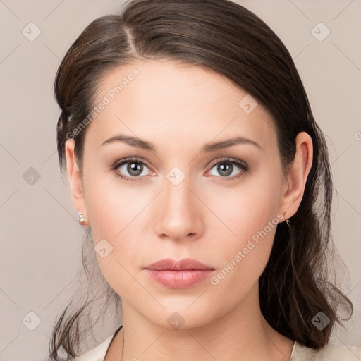 Neutral white young-adult female with medium  brown hair and brown eyes