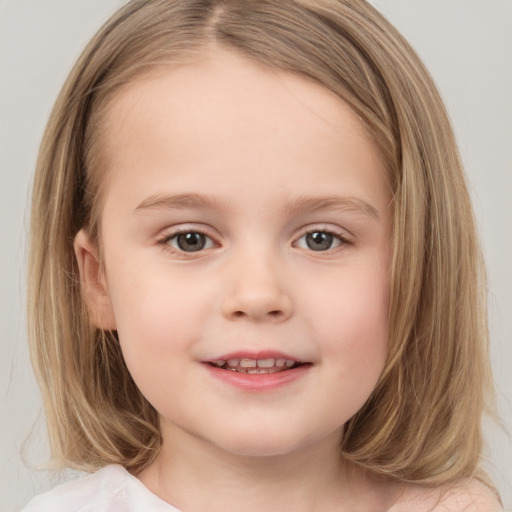 Joyful white child female with medium  brown hair and brown eyes